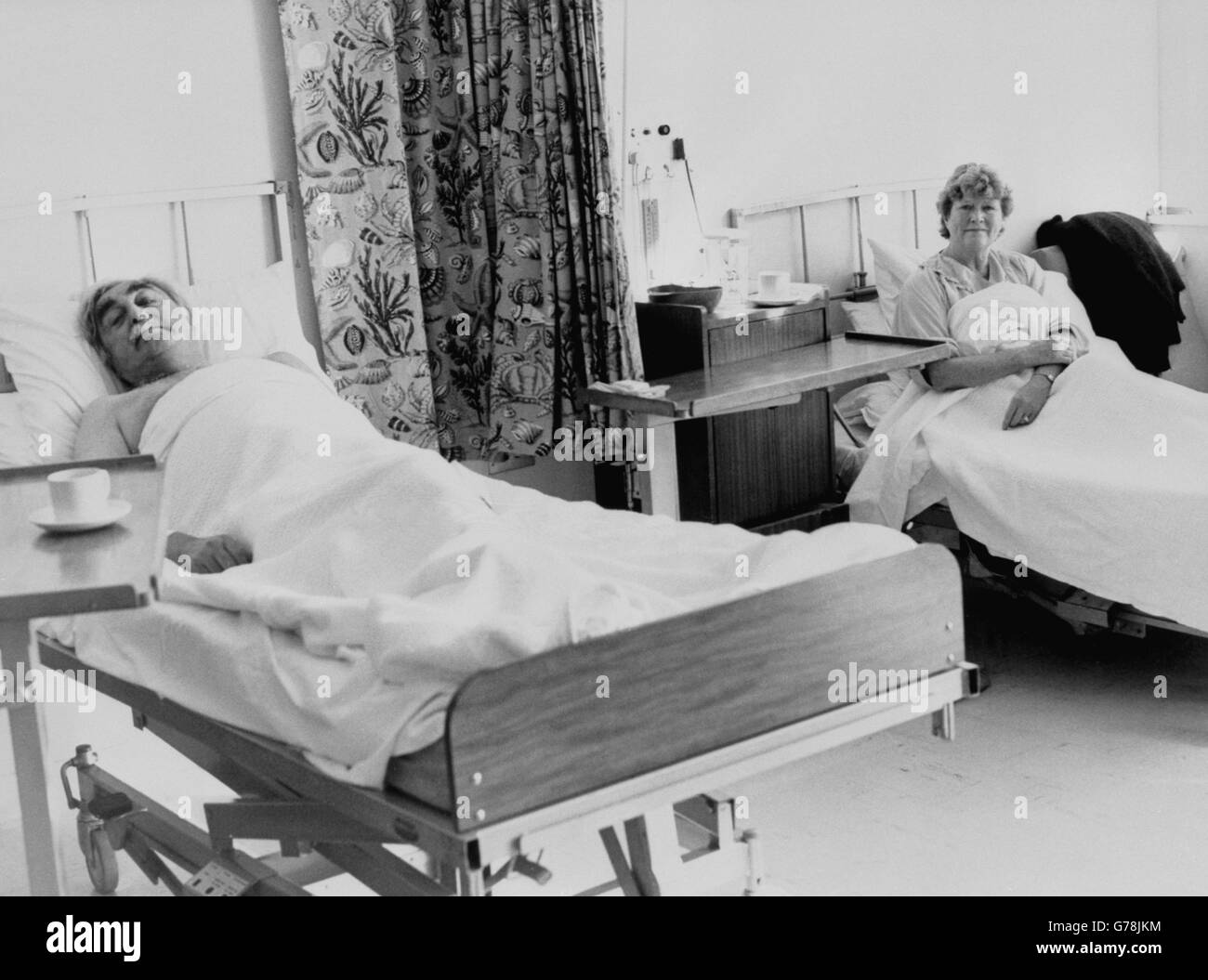 Sir Walter Clegg, Tory MP for Wyre, and his wife Elise in single beds at the Royal Sussex County Hospital, Brighton, recovering from their ordeal in the IRA bombing of the Grand Hotel. The couple were in Brighton for the Conservative Party Conference. Stock Photo