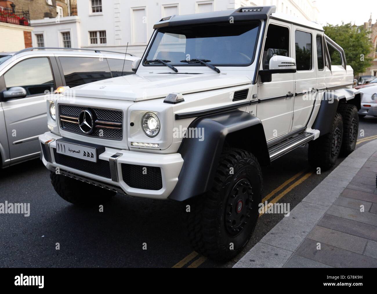 An AMG G63 6X6 bearing Arabic inscribed registration plates parked outside Harrods department store, Knightsbridge. Stock Photo
