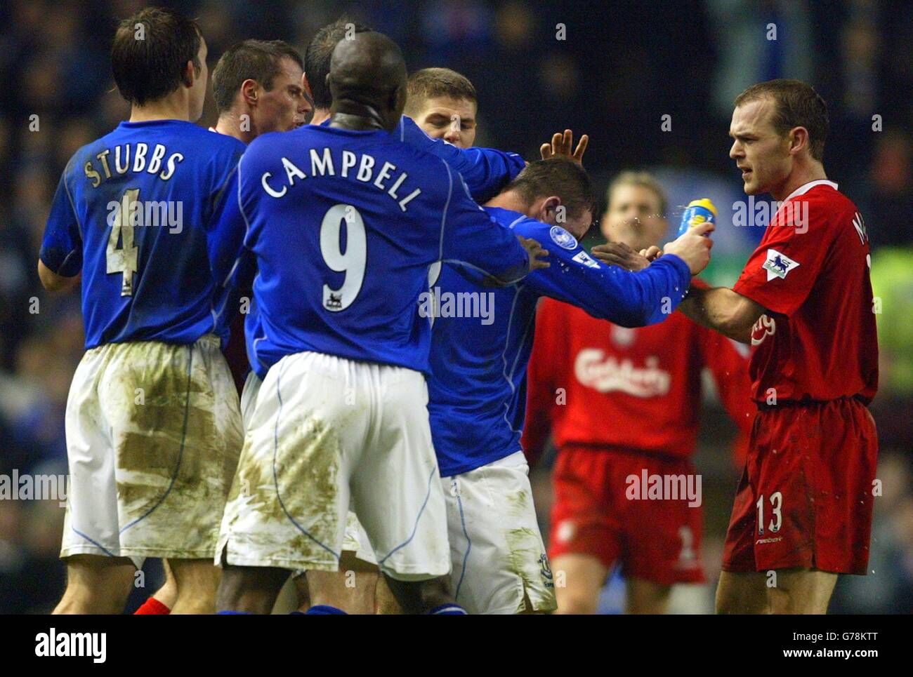 Liverpool's Steven Gerrard (centre) scuffles with Everton's Wayne Rooney (centre right) as team-mates arrive to separate the two, during their FA Barclaycard Premiership match at Anfield, Liverpool. Liverpool drew 0-0 with Everton. Stock Photo