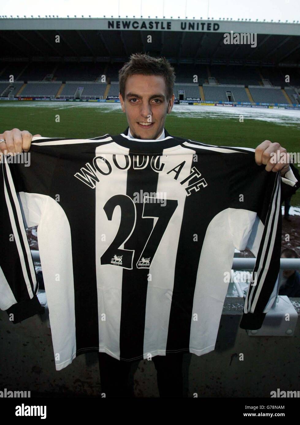 Newcastle United's new signing Jonathan Woodgate displays his new shirt at the club's St James' Park ground, following his 9m signing from Leeds United. Stock Photo