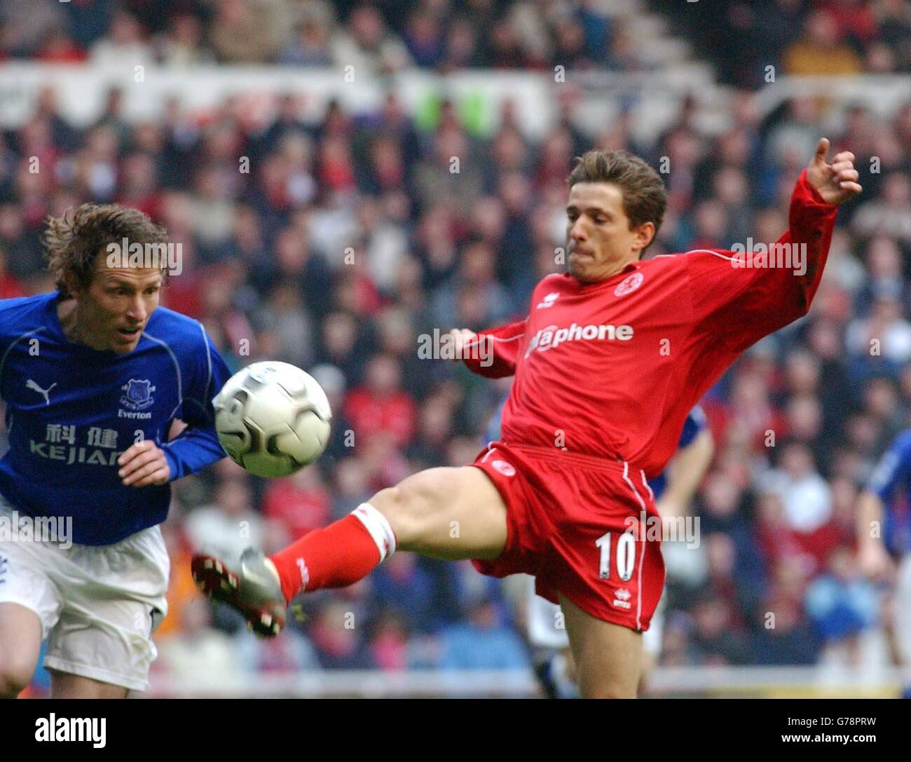 Juninho challenges Everton's Alan Stubbs during the FA Barclaycard Premiership match at the Riverside Stadium, Middlesbrough. Stock Photo