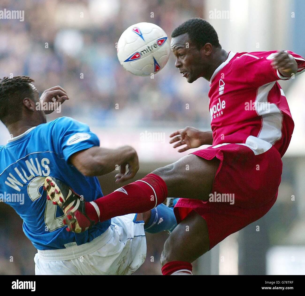Ipswich Town's Fabian Wilnis and Nottingham Forest's David Johnson challenge in the air for the ball, during their Nationwide Division One match at Ipswich's Portman Road ground. . Stock Photo