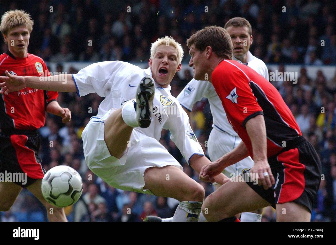 Leeds United's Alan Smith miskicks Blackburn's Craig Short in the face
