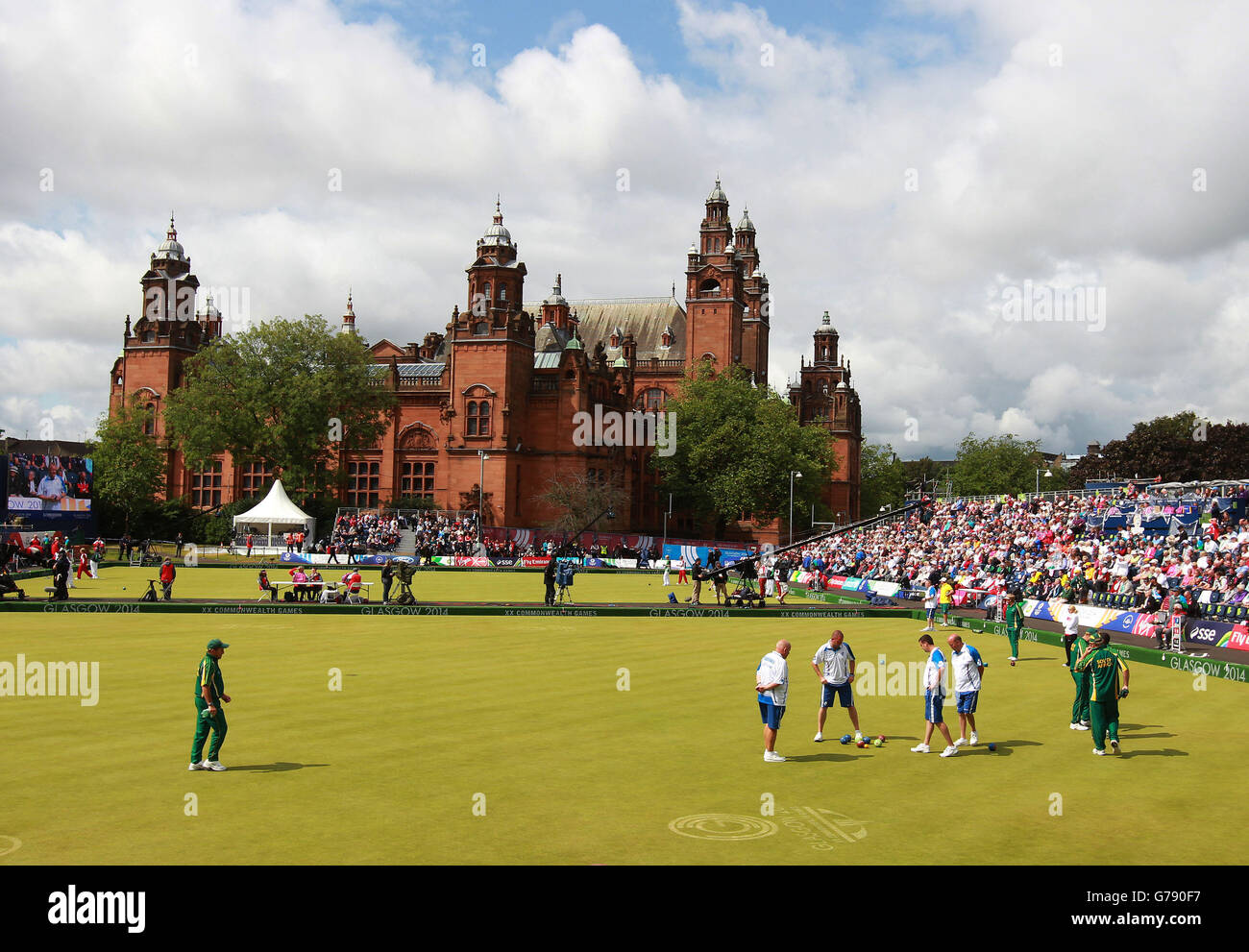 Scotland Men's Fours with skip Alex Marshall view the head against South Africa's Mens Fours in the Quarter-finals at Kelvingrove Lawn Bowls Centre, during the 2014 Commonwealth Games in Glasgow. Stock Photo