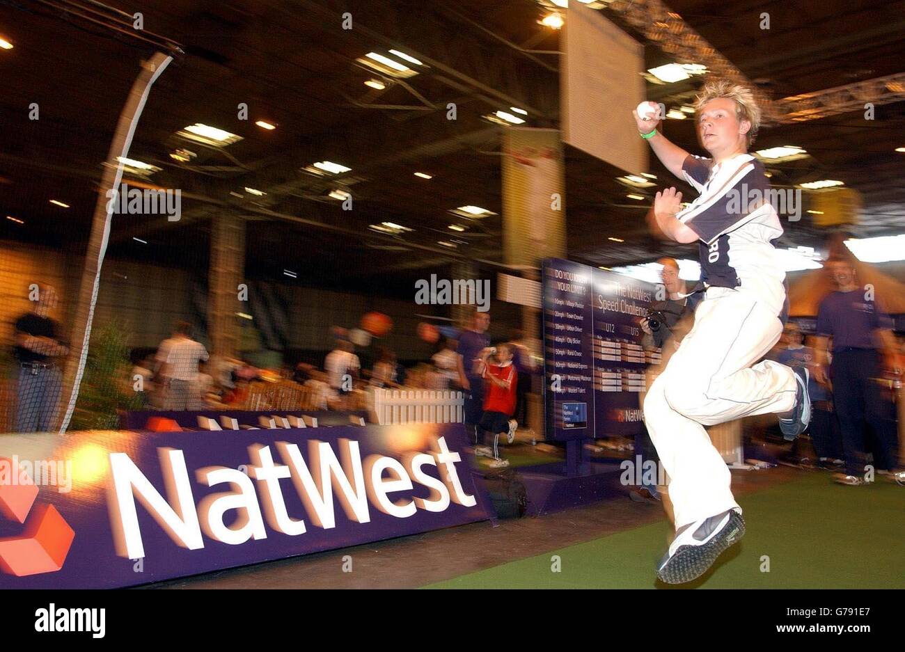 A young competitor takes part in the NatWest Speed Challenge Roadshow at Birmingham's NEC. The fatest bowlers, as recorded by a speed gun, will take part in the nationwide final on July 12 at Lords. Stock Photo