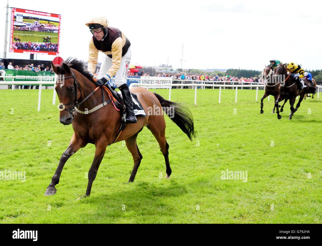 Blossom Gate and Robbie Power win the Vision Express Handicap Hurdle on day seven of the Galway Festival at Galway Racecourse, Ireland. Stock Photo