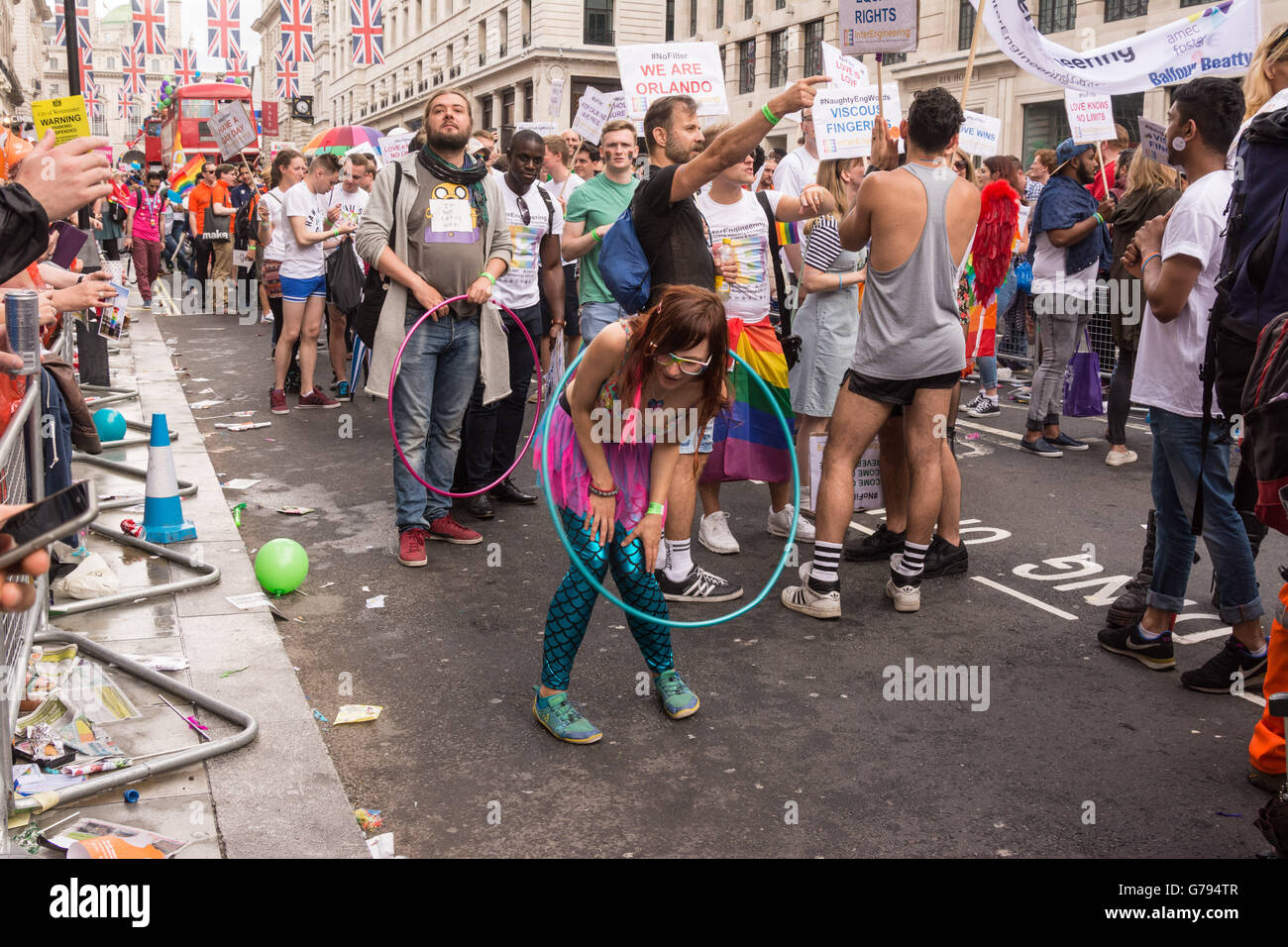 London UK 25th June 2016. A hula-hooper performs as the Gay Pride parade makes its way down Haymarket. Credit: Patricia Phillips/Alamy Live News Stock Photo