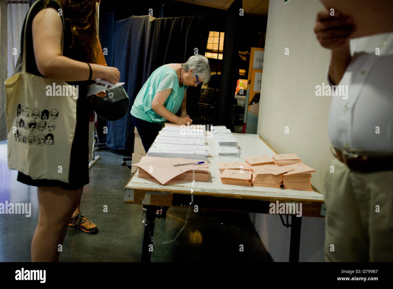 June 26, 2016 - Barcelona, Catalonia, Spain - A woman looks at ballots in a polling station in Barcelona, Spain. Spaniards are voting its second general election after six months of caretaker government. (Credit Image: © Jordi Boixareu via ZUMA Wire) Stock Photo