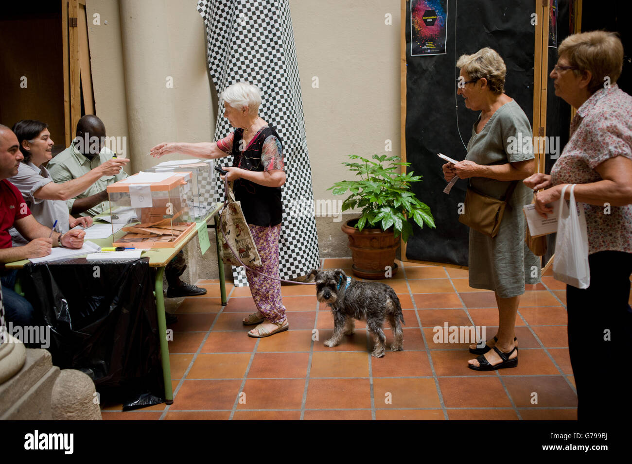 Barcelona, Spain. 26th June, 2016. A woman casts her vote in the national elections in Barcelona, Spain. Spaniards are voting its second general election after six months of caretaker government. Credit:   Jordi Boixareu/Alamy Live News Stock Photo