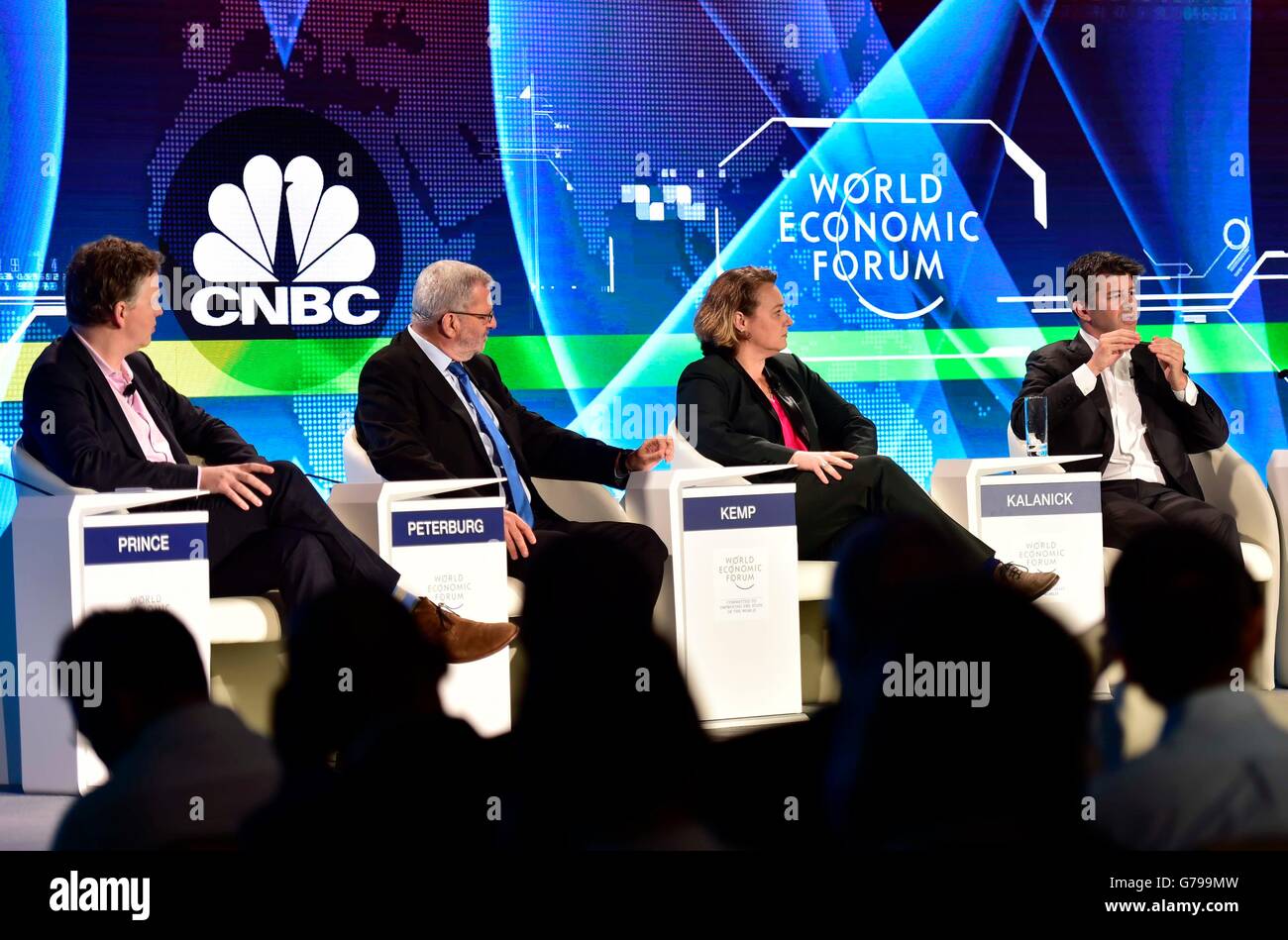 Tianjin, China. 26th June, 2016. Travis Kalanick (1st R), current CEO of the transportation network company Uber, speaks during a session named 'Technology Tipping Points: Digital Ubiquity' of the Annual Meeting of the New Champions 2016, or the Summer Davos Forum, in Tianjin, north China, June 26, 2016. Credit:  Yue Yuewei/Xinhua/Alamy Live News Stock Photo
