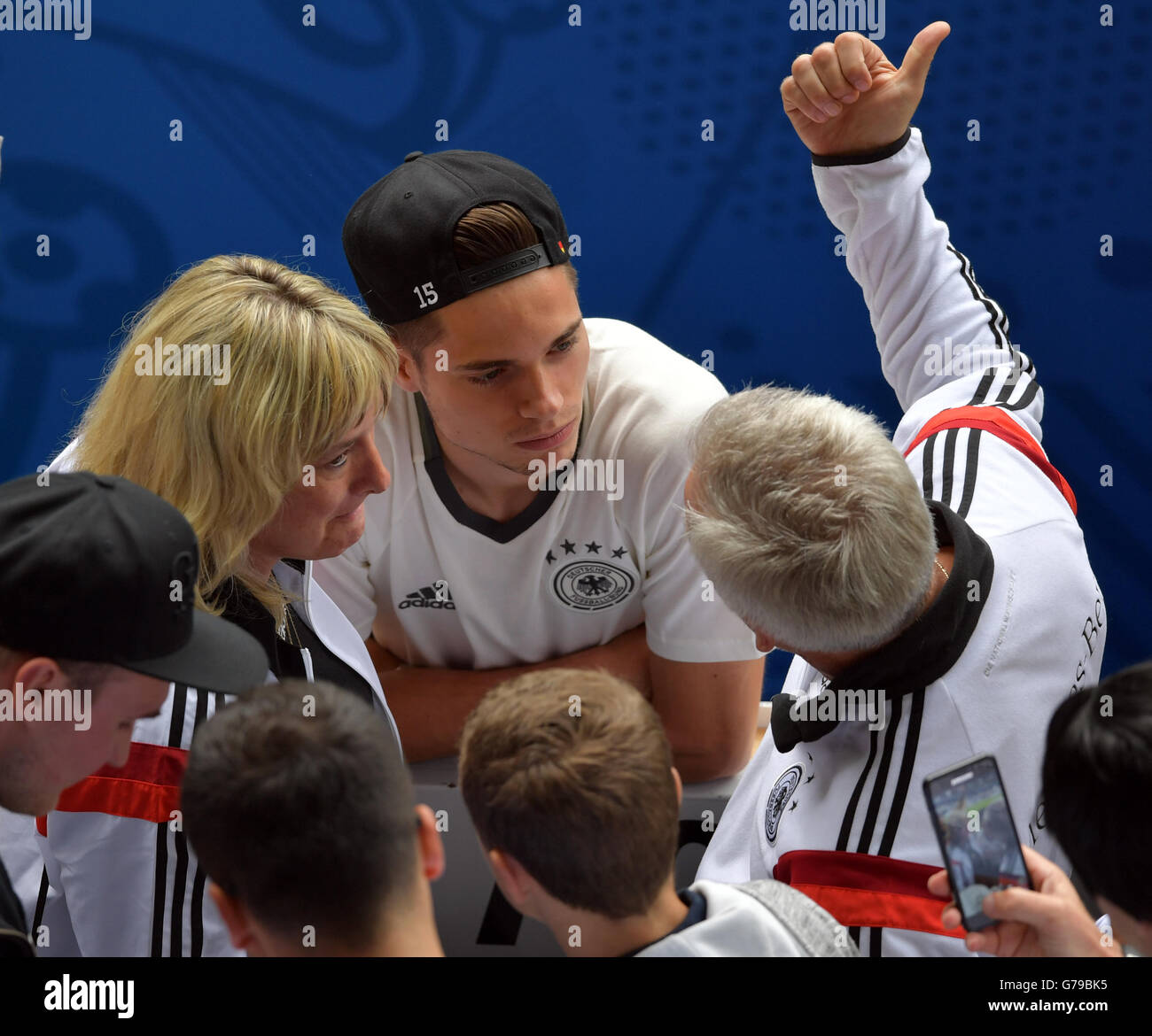 Lille, France. 26th June, 2016. Julian Weigl (C) of Germany talks to his  parents, father Hans (R) and mother Sabine, prior to the UEFA EURO 2016  Round of 16 soccer match between