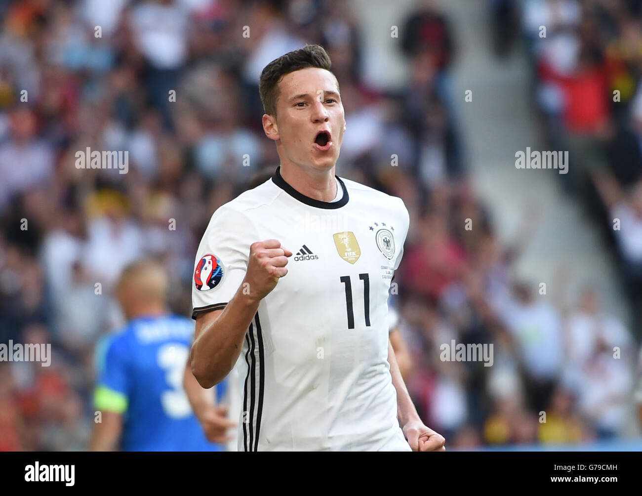 Lille, France. 26th June, 2016. Julian Draxler of Germany celebrates scoring during the Euro 2016 round of 16 football match between Germany and Slovakia in Lille, France, June 26, 2016. Credit:  Tao Xiyi/Xinhua/Alamy Live News Stock Photo