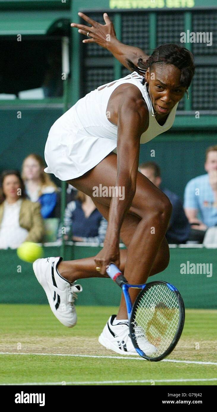 Venus Williams in action against fellow American Lindsay Davenport in the ladies quarter finals at the All England Lawn Tennis Championships at Wimbledon. Stock Photo
