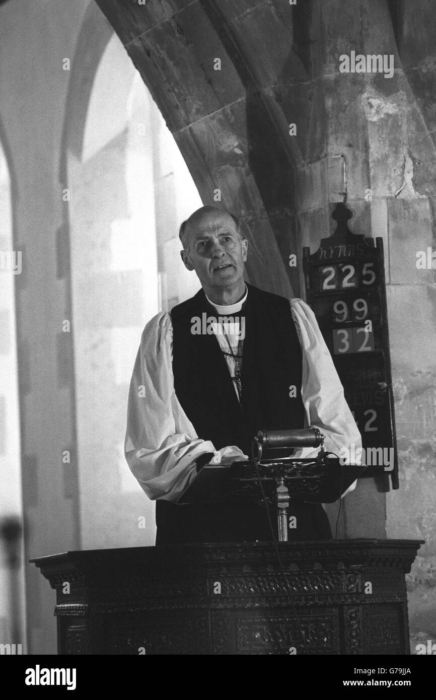 The Bishop of Salisbury, the Rt Rev. John Walker, preaches the sermon from pulpit at St Margaret of Antioch Church in the village of Chilmark, Wiltshire, following last week's vicarage fire in which three young daughters of the Rev. Malcolm Acheson died. Stock Photo