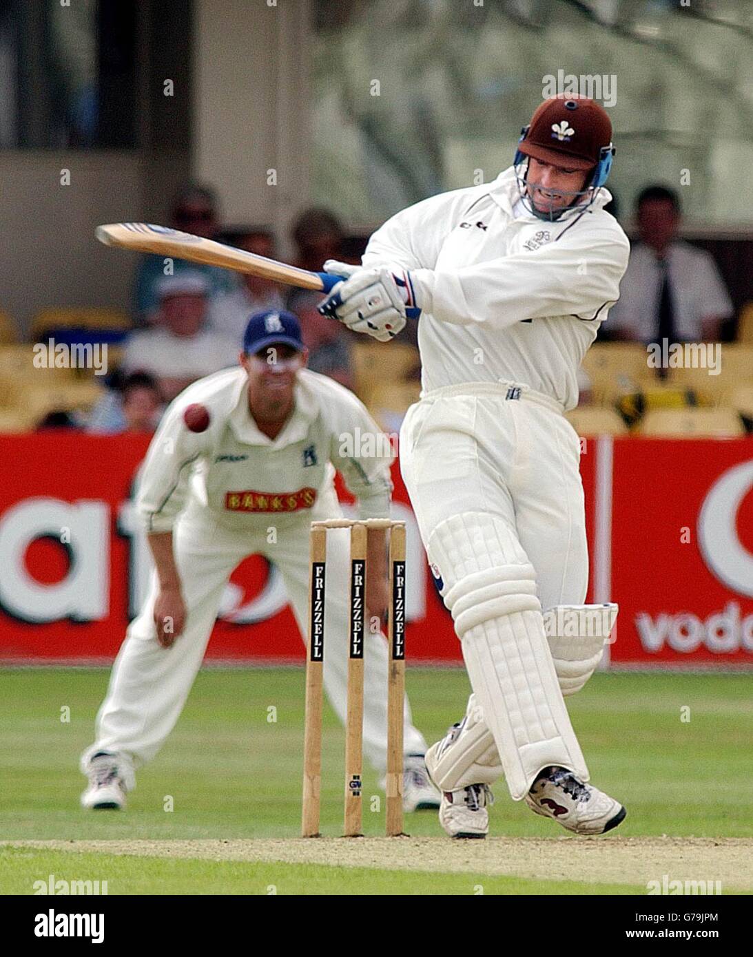 Surrey's Graham Thorpe hits a ball from Warwickshire's Neil Carter during the first day of the Frizzell County championship match at Edgbaston. Stock Photo