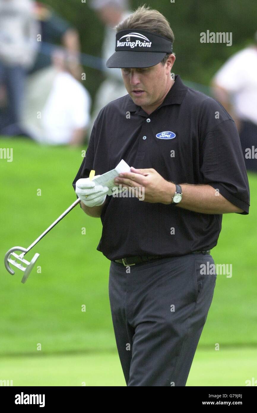 American Phil Mickelson checks his score card, on his way to the eleventh tee during the Barclays Scottish Pro-Am at Loch Lomond golf club near Balloch. Stock Photo