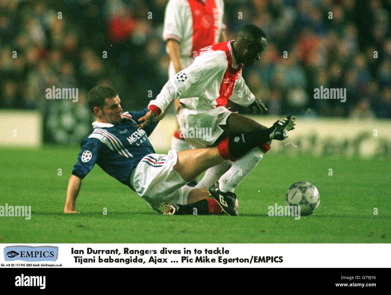 Ian Durrant, Rangers dives in to tackle Tijani Babangida, Ajax Stock Photo