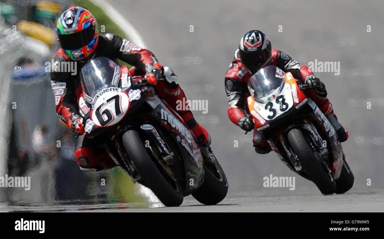 (No 67) Great Britain's Shane Byrne, followed by (No 38) on Giancarlo De Matteis, his way to winning the first race of the day in round 9 of the SBK World Superbike Championship at Brands Hatch in Kent. Stock Photo