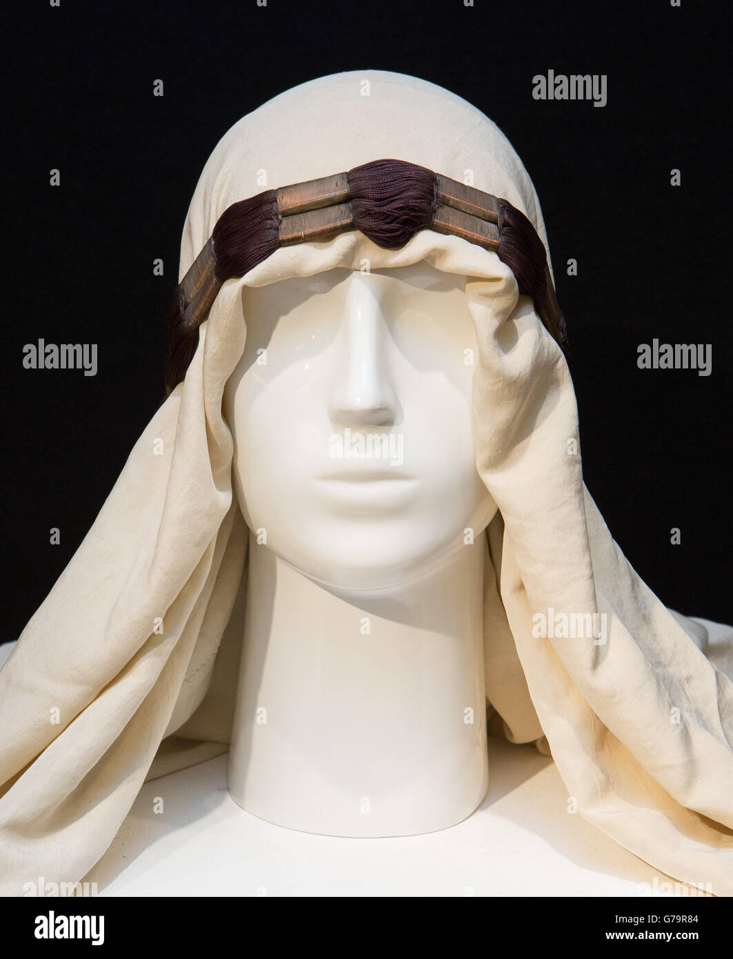 An ivory silk headdress owned by T E Lawrence which is part of the Famous and Infamous exhibition which includes highlights from the collection of Jersey collector David Gainsborough Roberts at Christie's in London. Stock Photo