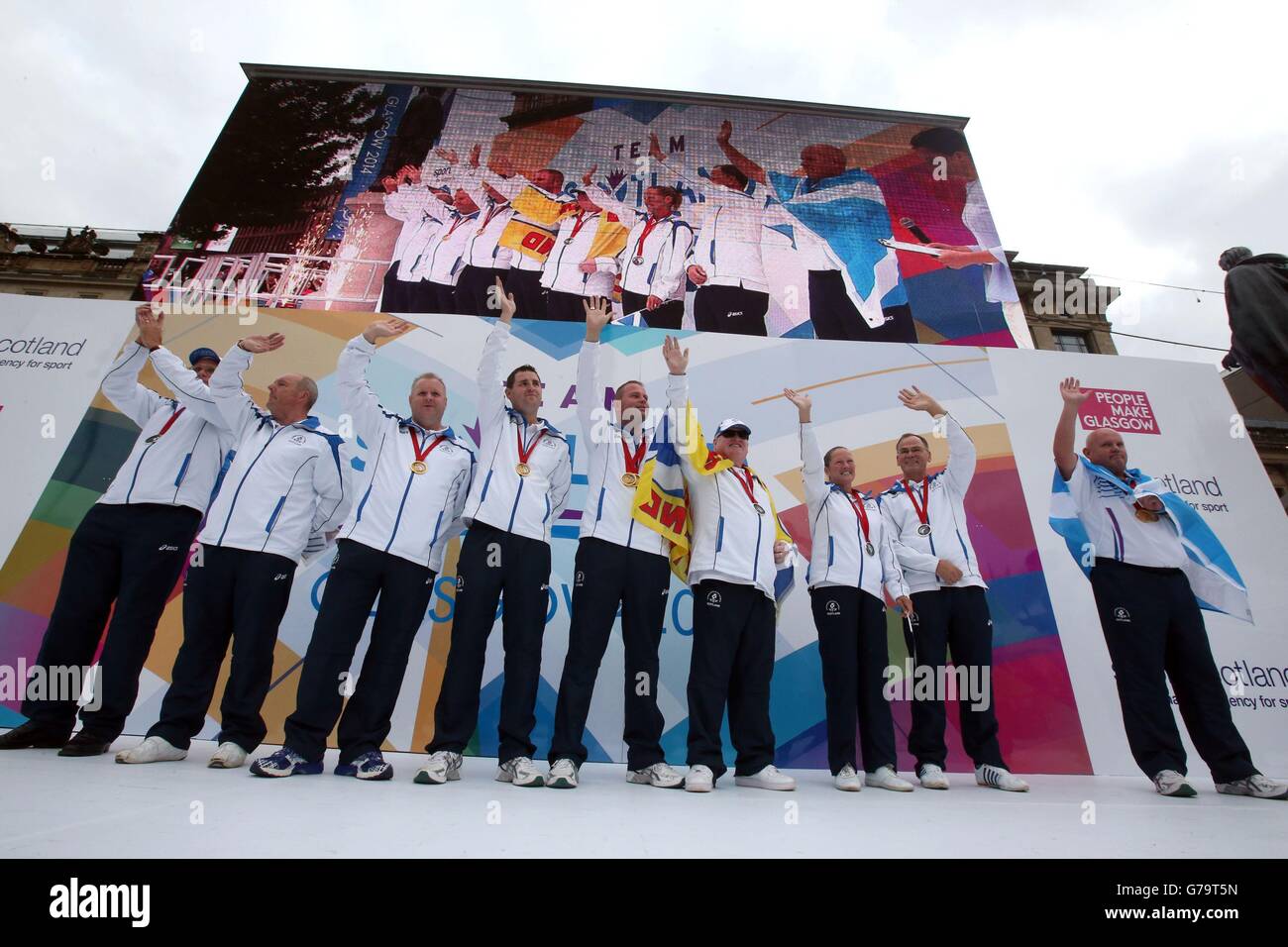 Team Scotland's Lawn Bowls team takes the applauds during the