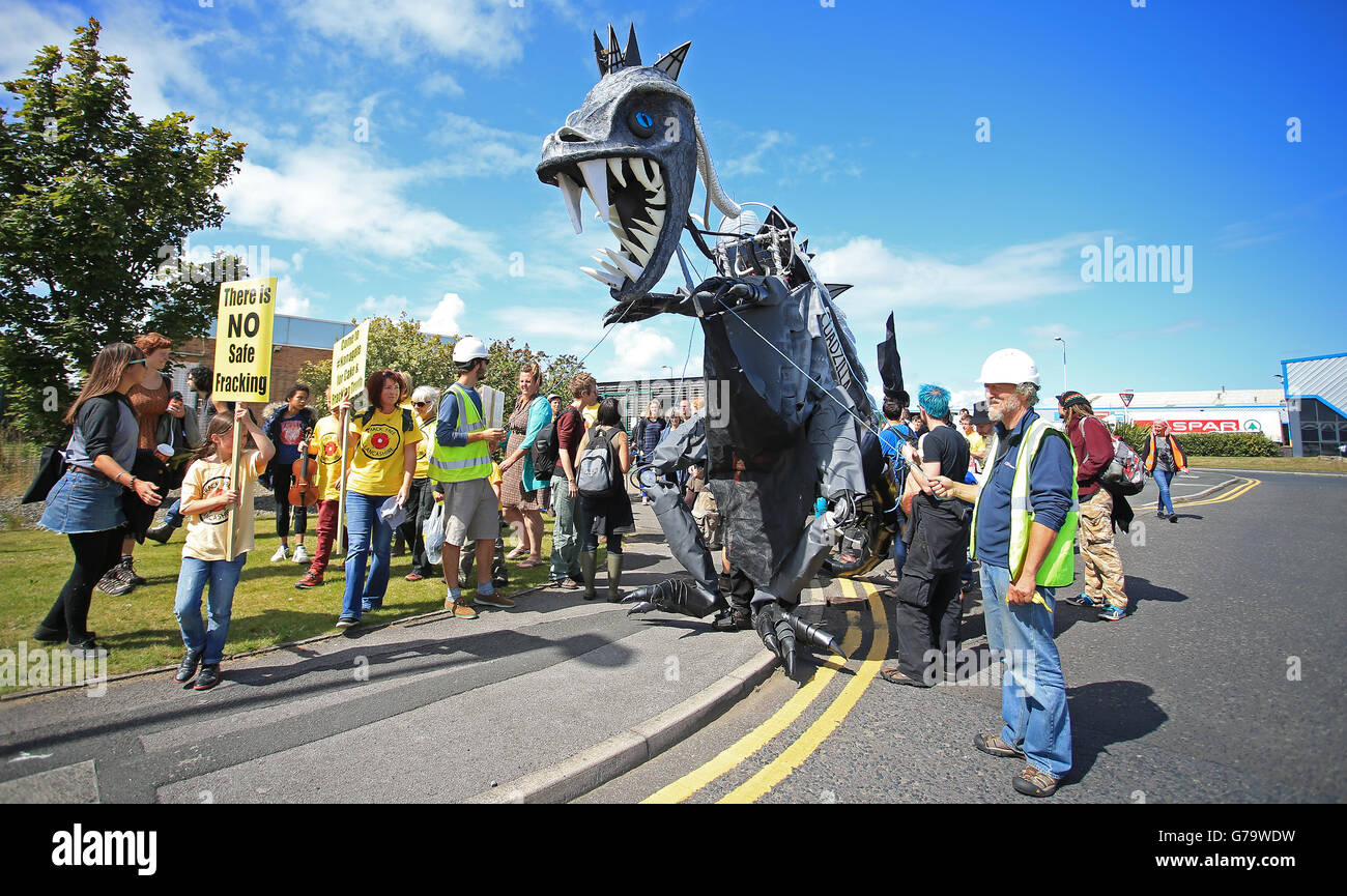 Anti-fracking protestors gather outside the Cuadrilla offices in ...