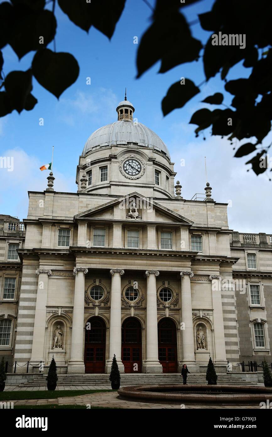 The tricolor flies at half mast at Government Buildings in Dublin