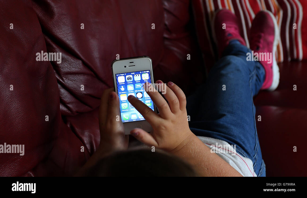 PICTURE POSED BY MODEL Generic stock photo of a child using an Apple ...