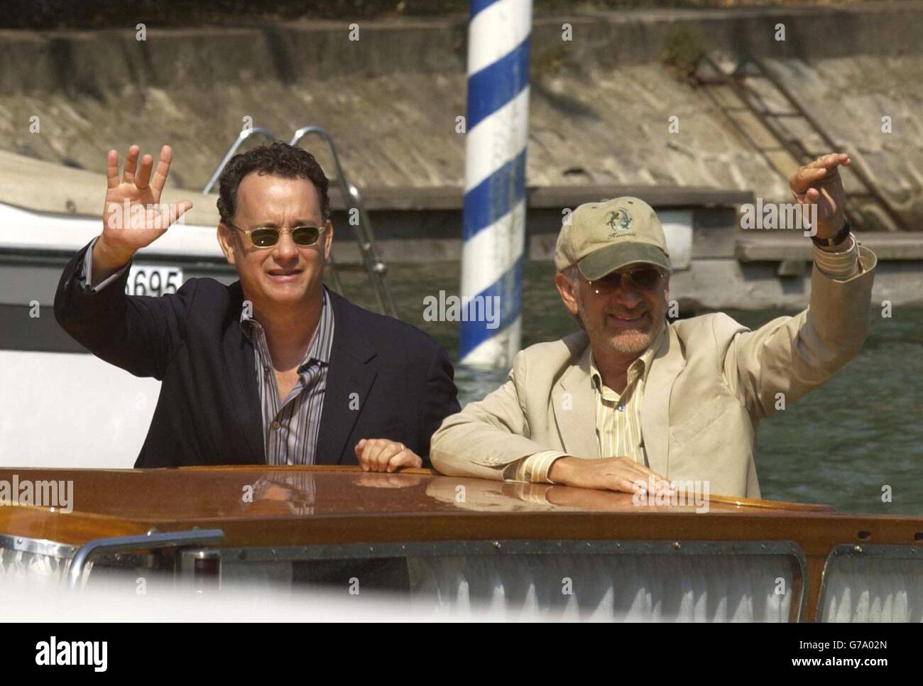 Director Steven Spielberg (right) and actor Tom Hanks arrive for a photocall at the Lido in Venice to promote his new film Terminal during the 61st International Venice Film Festival. Stock Photo