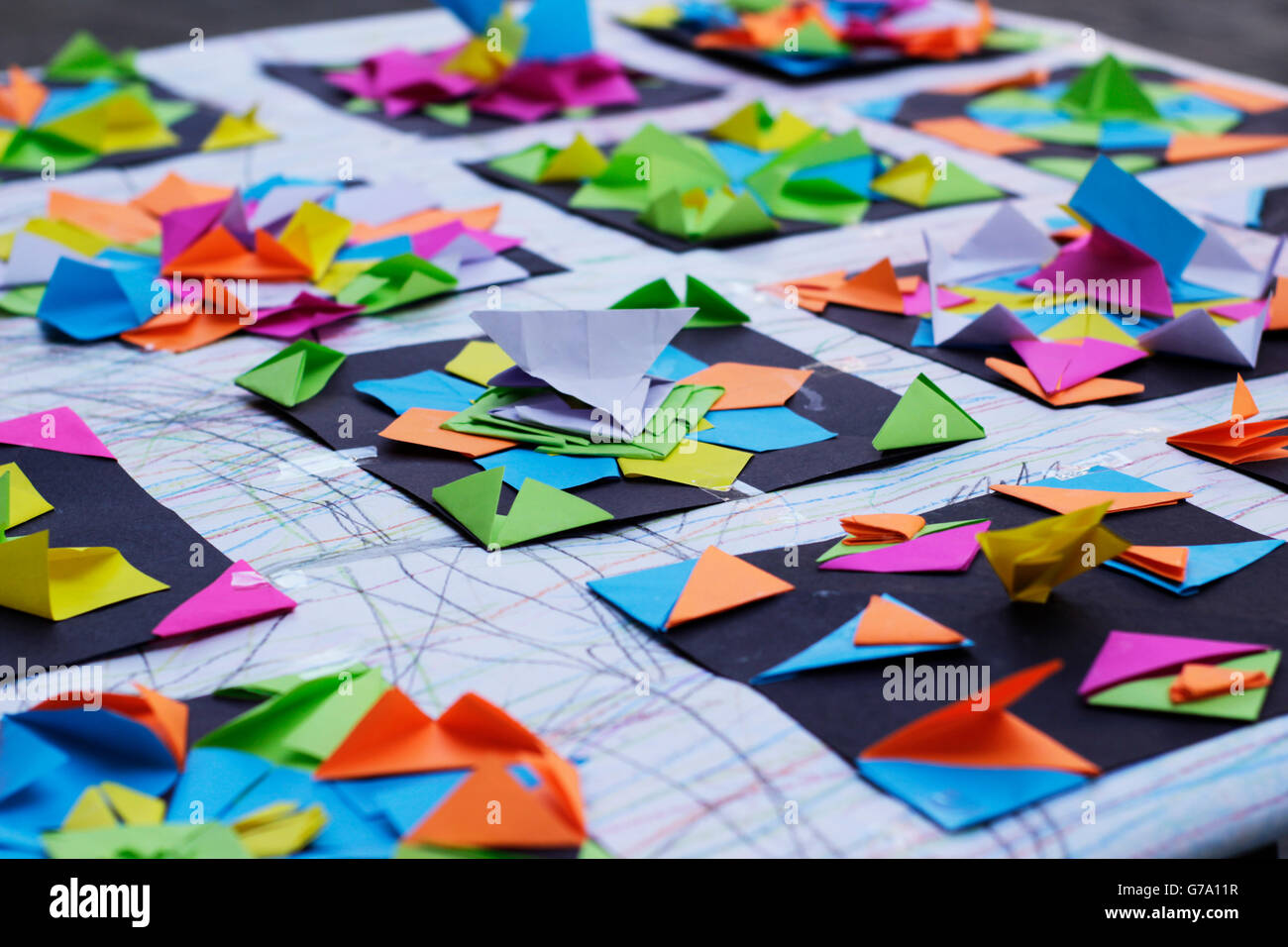 Photograph of some colorful geometric paper origamis Stock Photo