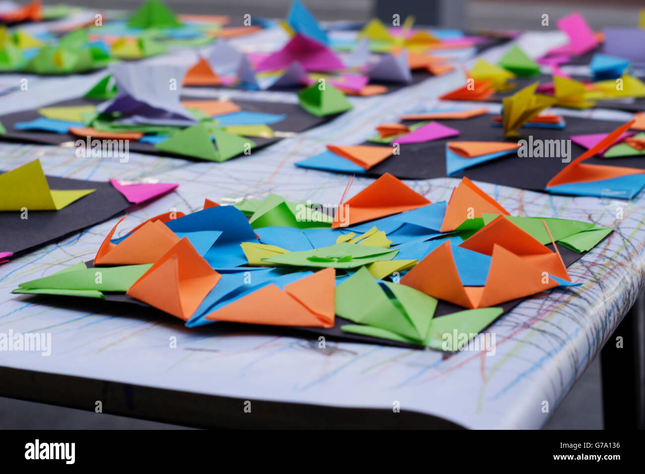 Photograph of some colorful geometric paper origamis Stock Photo