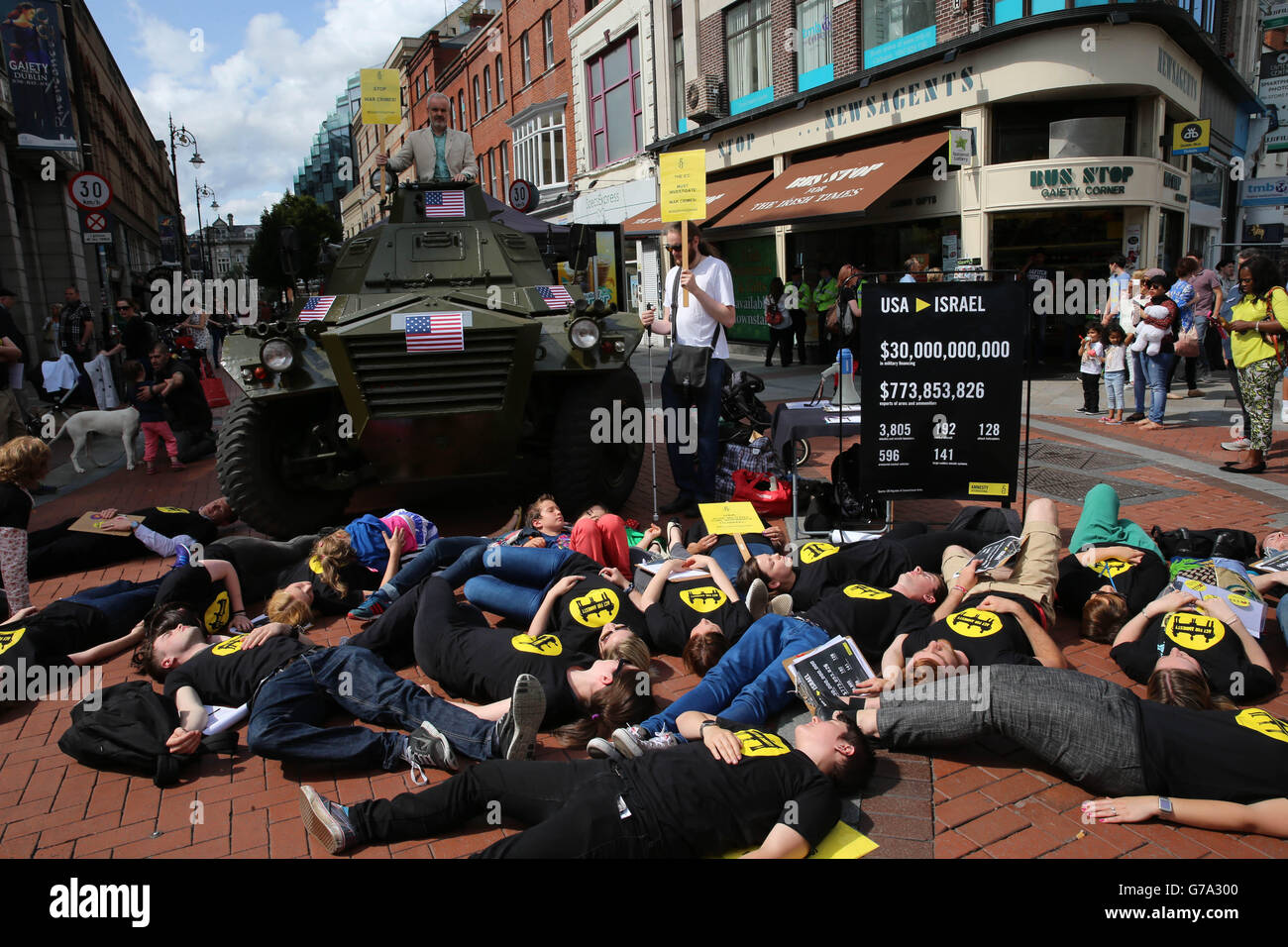STANDALONE PHOTO. Volunteers take part in a Die in on Grafron Street, Dublin, where Amnesty International called on the US government to immediately end its ongoing deliveries of large quantities of arms to Israel, which are fuelling serious violations of international law in Gaza. Stock Photo