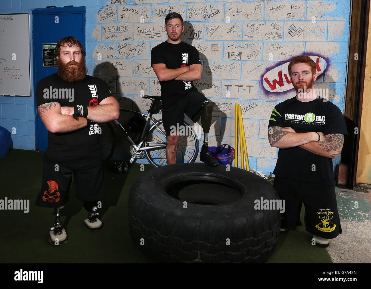 Left to right. Stevie Richardson, Jake Bartlett and James Simpson train at CrossFit, Leeds, ahead of taking part in the Spartan Race event. Stock Photo