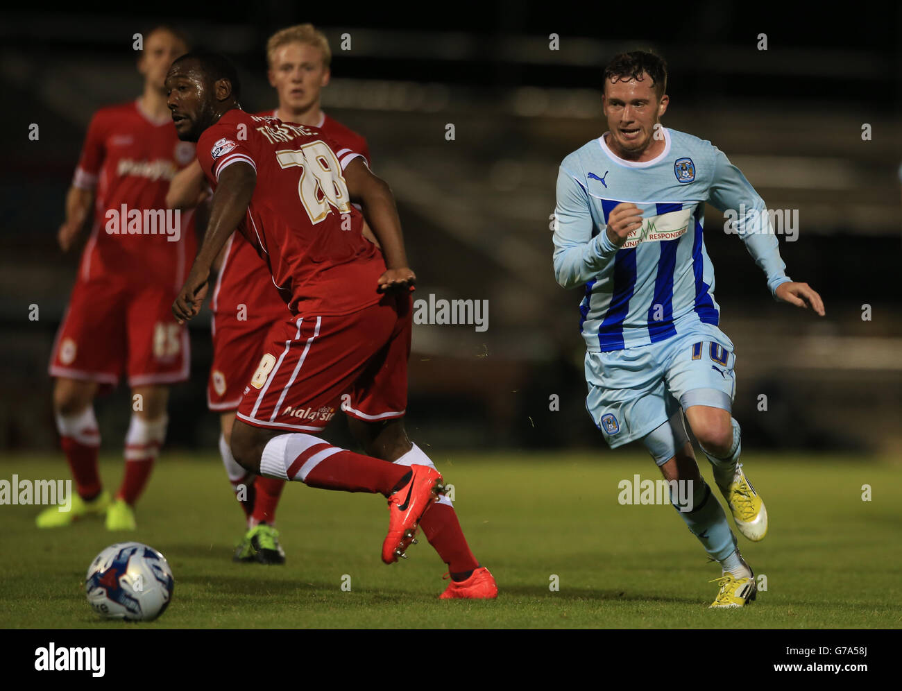 Coventry City's Danny Swanson breaks past Cardiff City's Kevin Theophile-Catherine , during the Capital One Cup First Round match at Sixfields Stadium, Northampton. Stock Photo