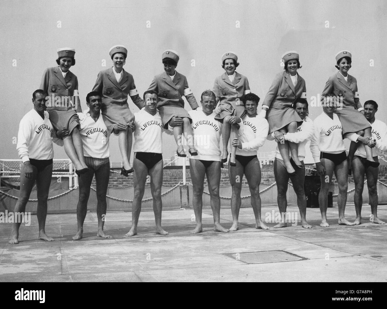 Tourism - Life Guards and Promettes - Brighton Stock Photo