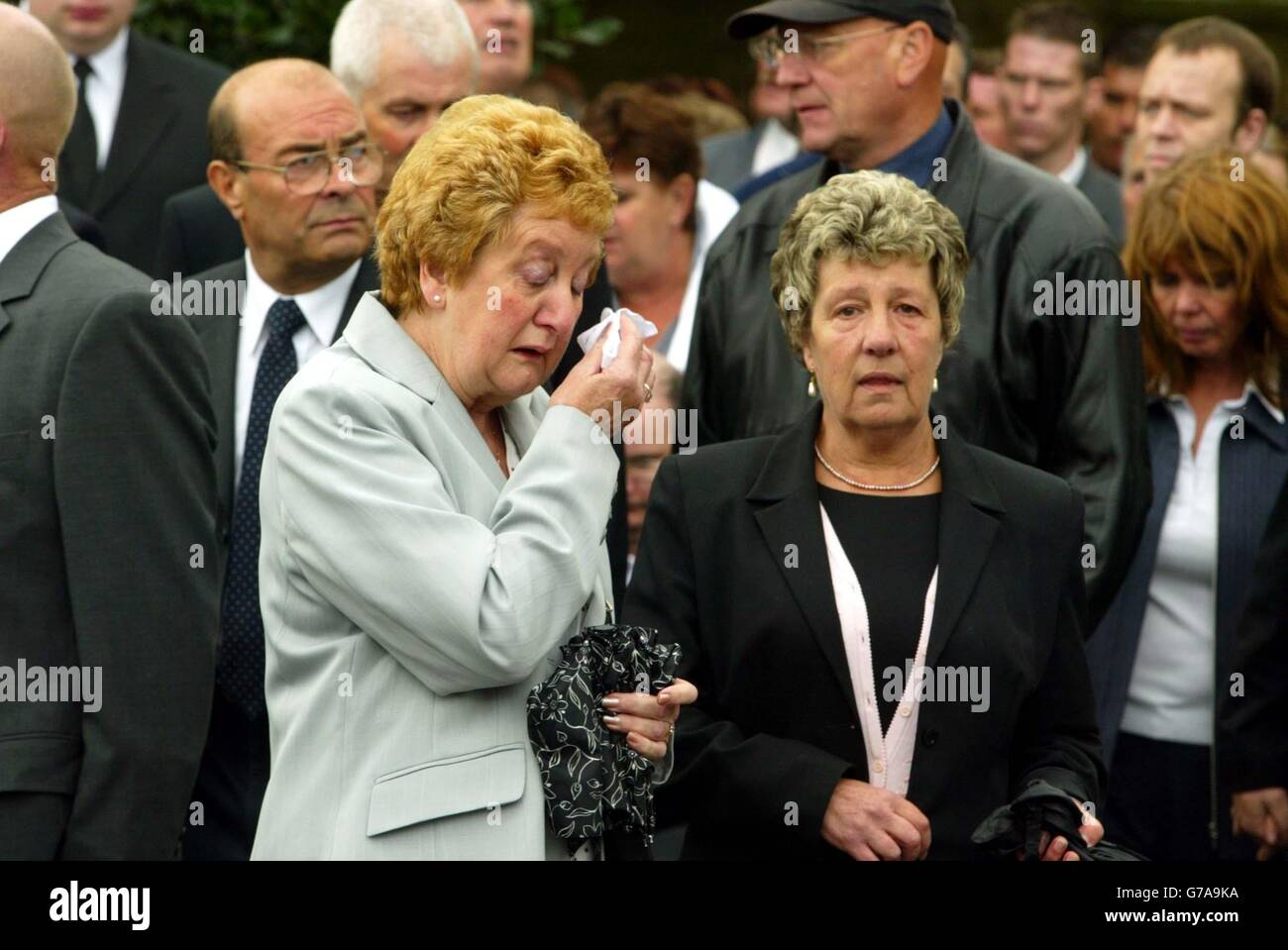 A Weeping Mourner attends the Funeral for Ex Miner Keith Frogson at St ...