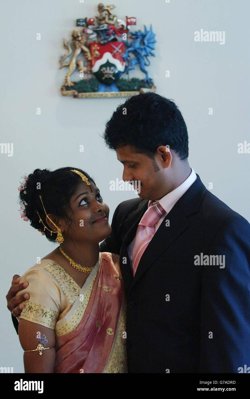Sivaruban Sivasubramaniam (left) and Sripriya Ramamoorthy celebrate their wedding at Brent Town Hall, which became the first wedding to take place on a Sunday in the UK. It is hoped that the service will be of particular importance to Brent's diverse communities, particularly to those whose cultural traditions mean that they wish to marry on a Sunday. Stock Photo