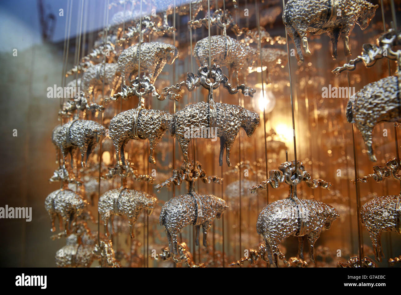 The Brooks Brothers store display - whose company trademark has been a golden fleece since 1850, on London's Regent Street is one of fifteen windows along the shopping street which has been specially dressed to mark this year's Regent Street Windows Project, which celebrates and showcases London's architectural creative talent forming part of the London Design Festival as well as coinciding with London Fashion Week. Stock Photo