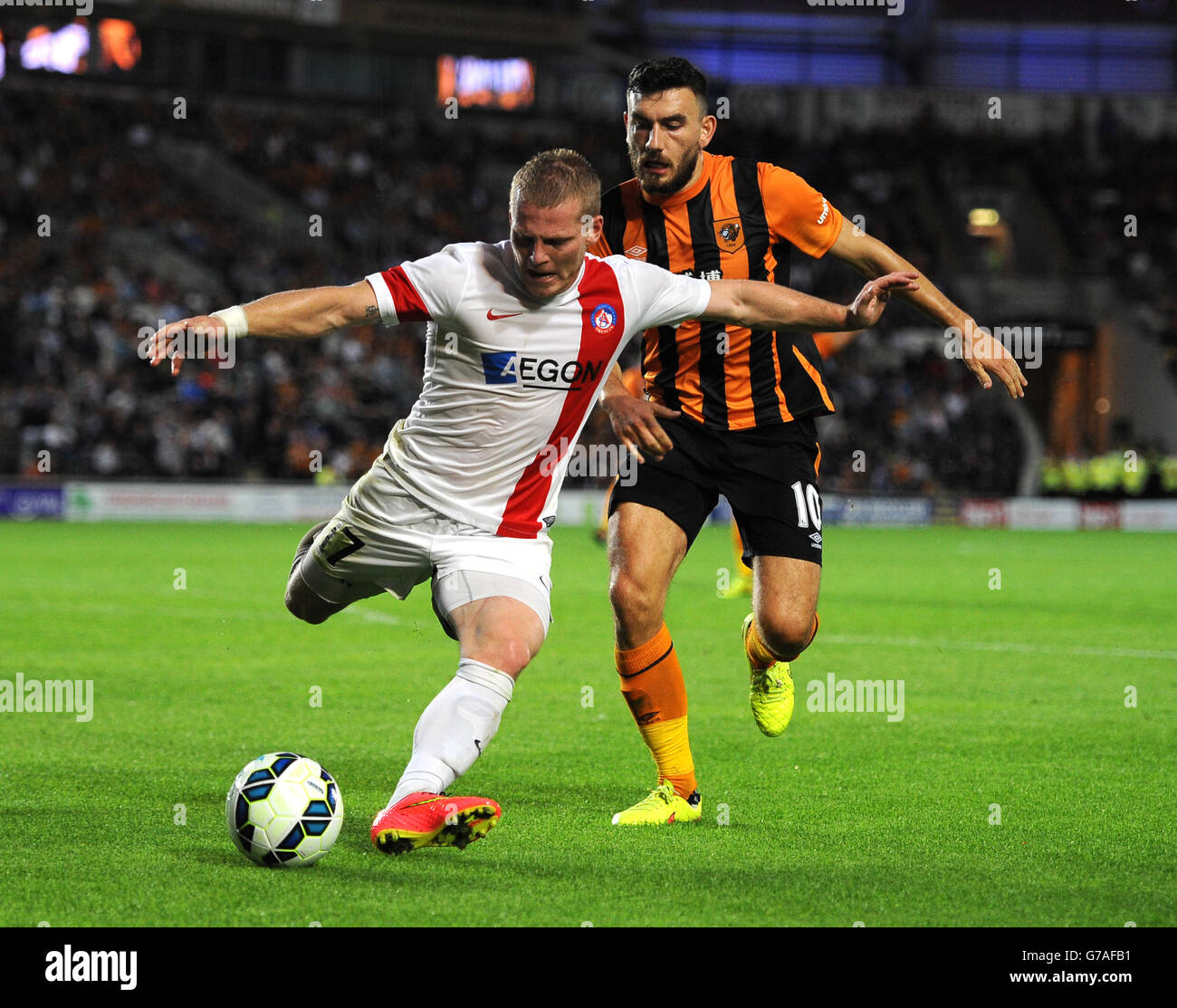 Soccer - UEFA Europa League - 3rd Qualifying Round - 2nd leg - Hull City v FK AS Trencin - KC Stadium. Hull City's Robert Snodgrass (right) and Trencin's Peter Cogley (left) battle for the ball. Stock Photo