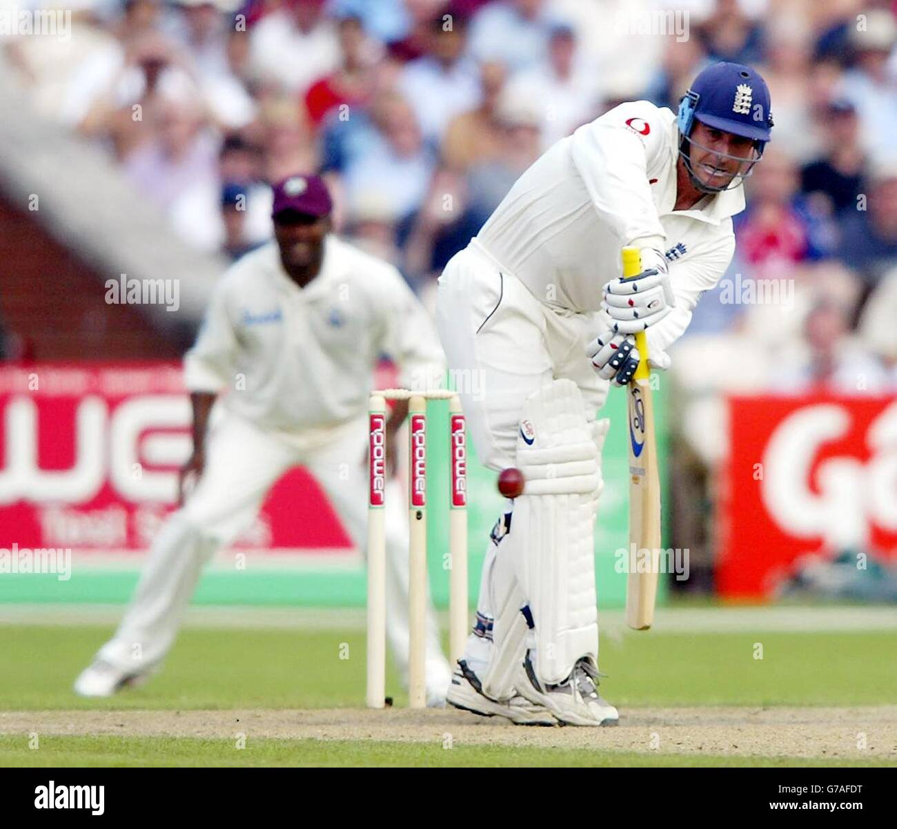 England's Graham Thorpe hits for 4 against the West Indies during the third day of their third npower test at Old Trafford, Manchester. Stock Photo