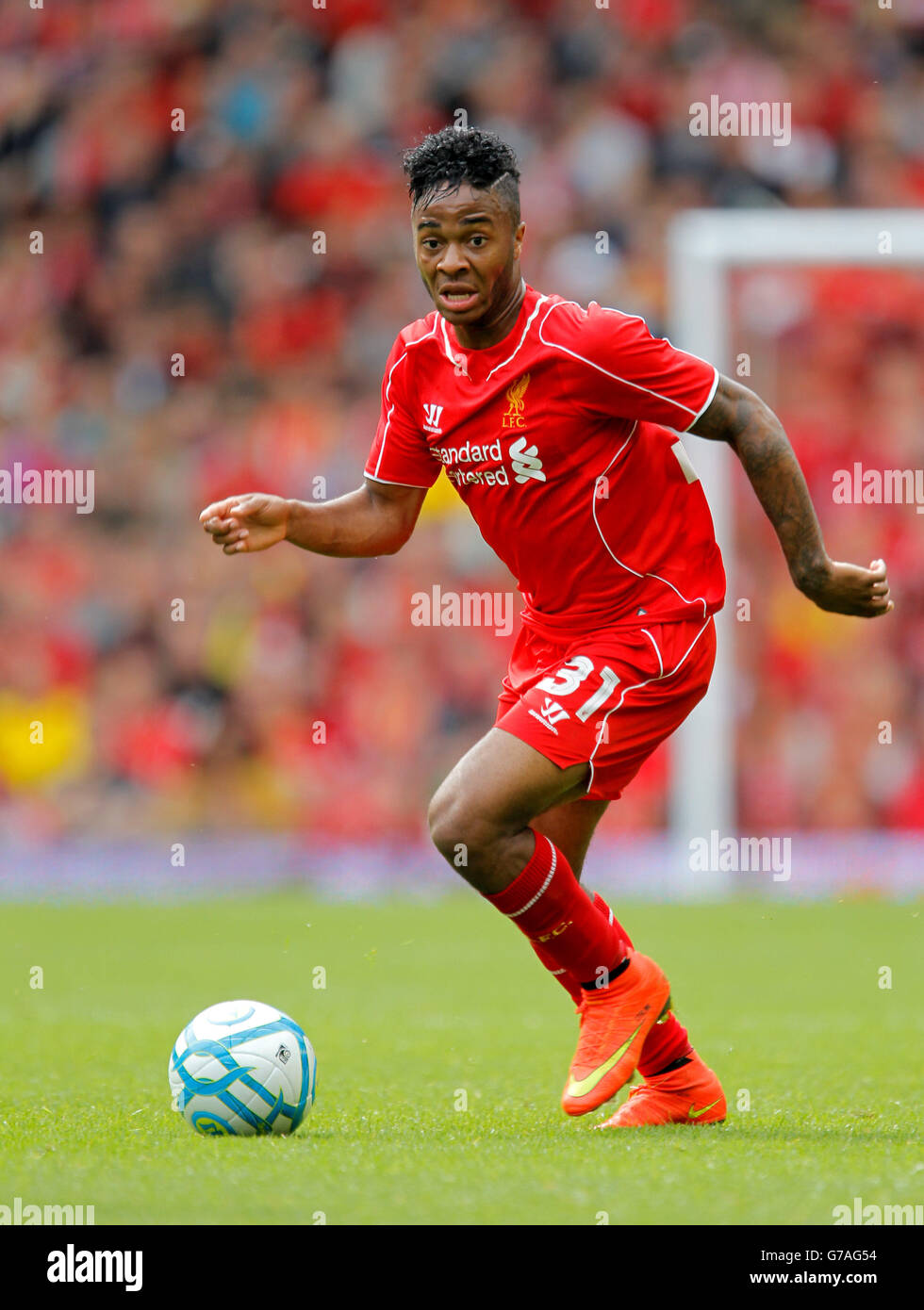 Soccer - Pre Season Friendly - Liverpool v Dortmund. Liverpool's Raheem Sterling in action during the Pre-Season friendly match at Anfield Stadium, Liverpool. Stock Photo