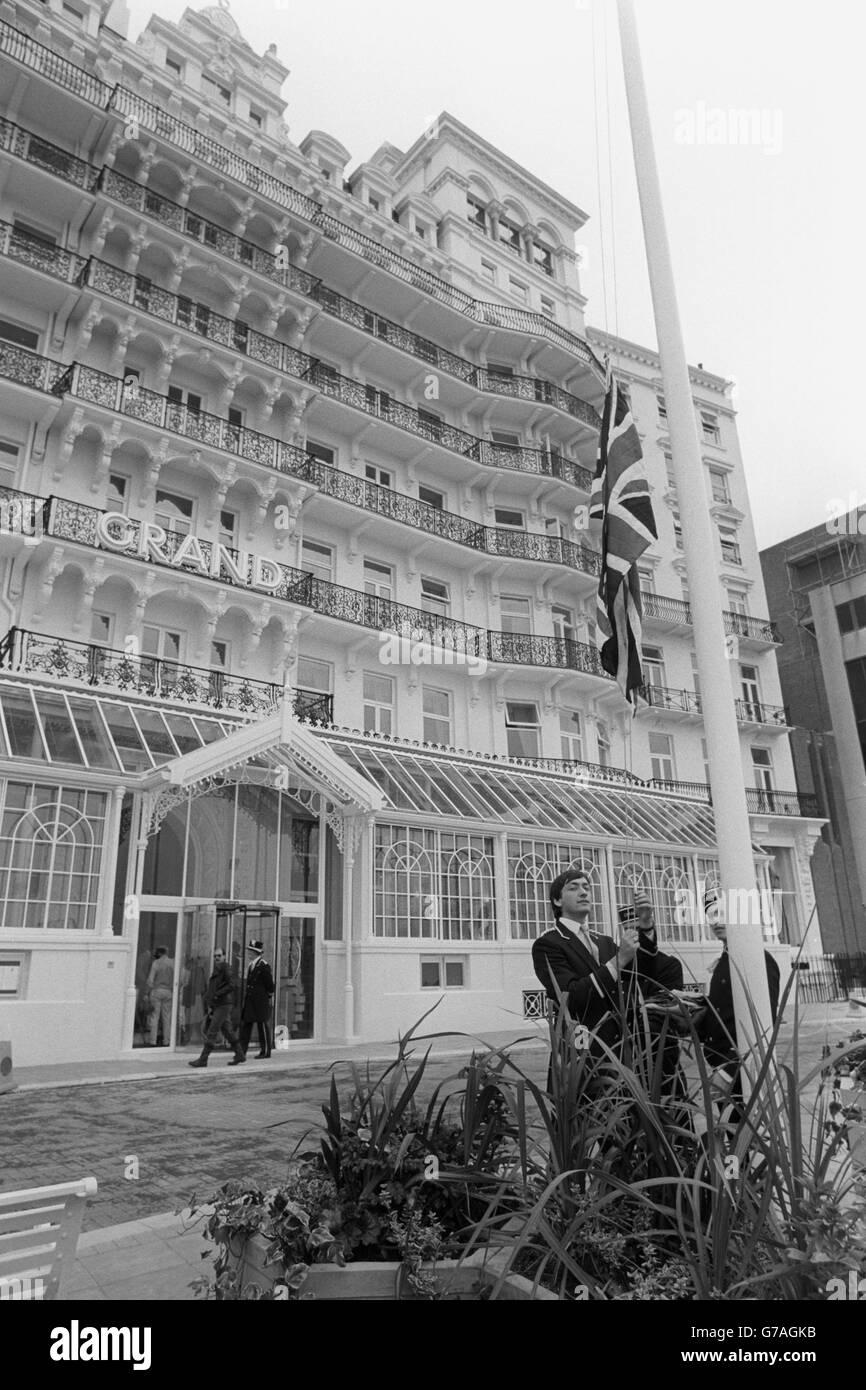 The Union Flag is hoisted outside the Grand Hotel in Brighton after it re-opened for business 22 months after being wrecked by a IRA bomb on the last night of the 1984 Conservative Party Conference, which killed 5 and injured 31 people. Stock Photo