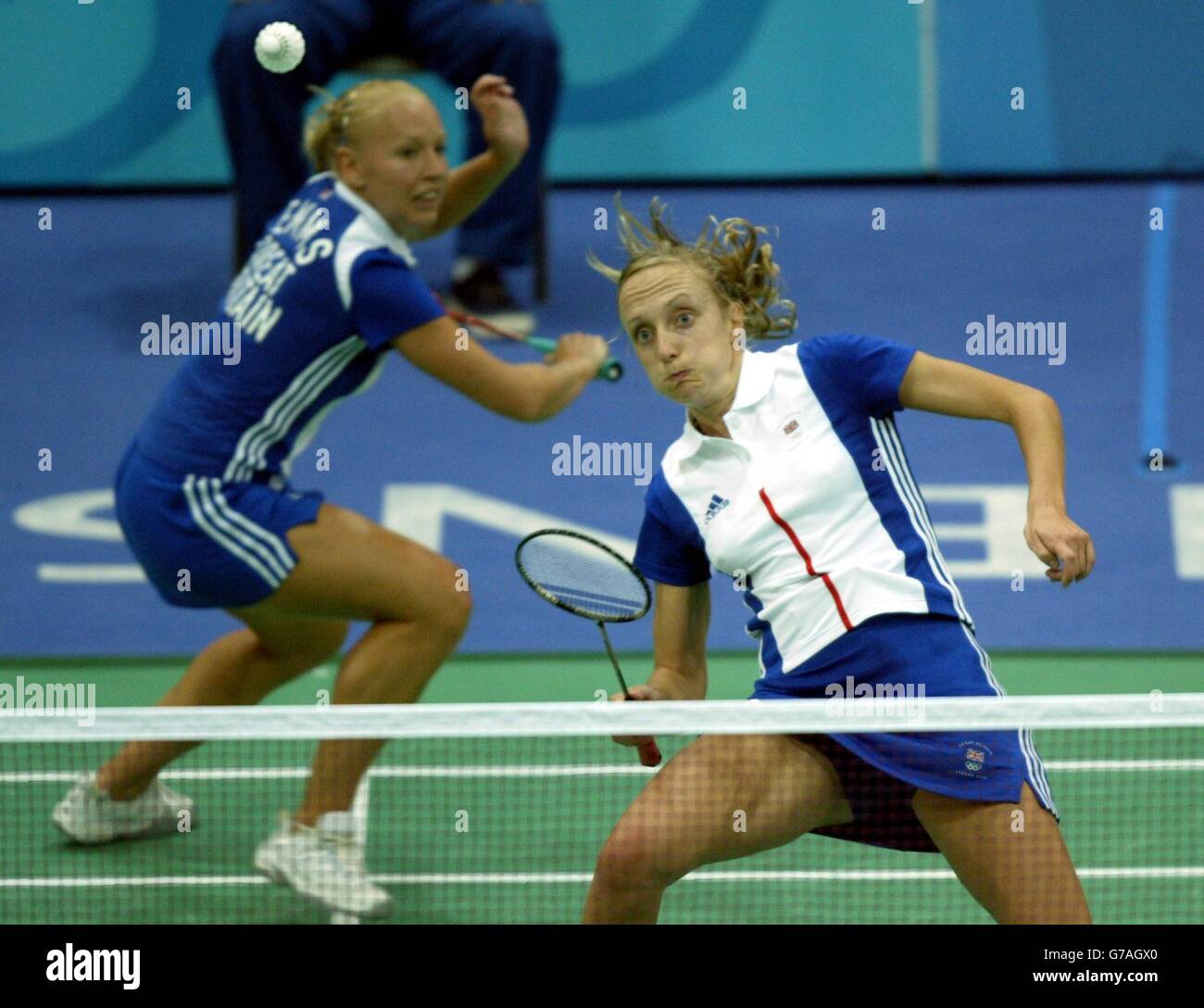 Britain's Donna Kellogg (right) and Gail Emms in action against China's Tingting Zhao and Yili Wei in the Badminton Women's Doubles qualifiers at the Goudi Olympic Hall in Athens, Greece. Stock Photo