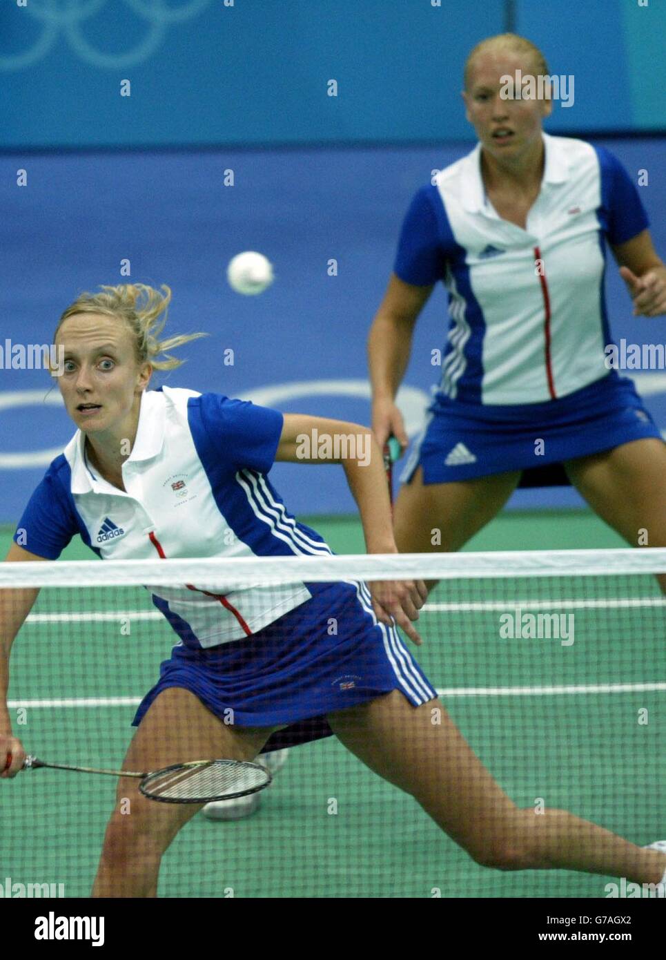 Britain's Donna Kellogg (left) and Gail Emms in action against China's Tingting Zhao and Yili Wei in the Badminton Women's Doubles qualifiers at the Goudi Olympic Hall in Athens, Greece. Stock Photo