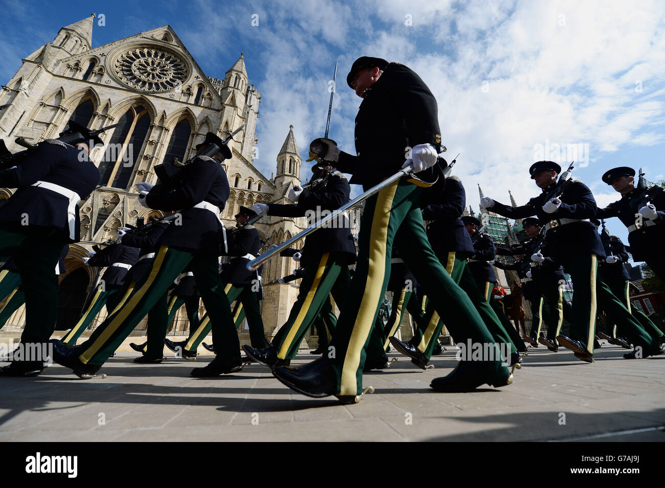 The Royal Dragoons Guard march past York Minster as they parade through the City ahead of a service in the Minster as part of the WWI Commemorations. Stock Photo