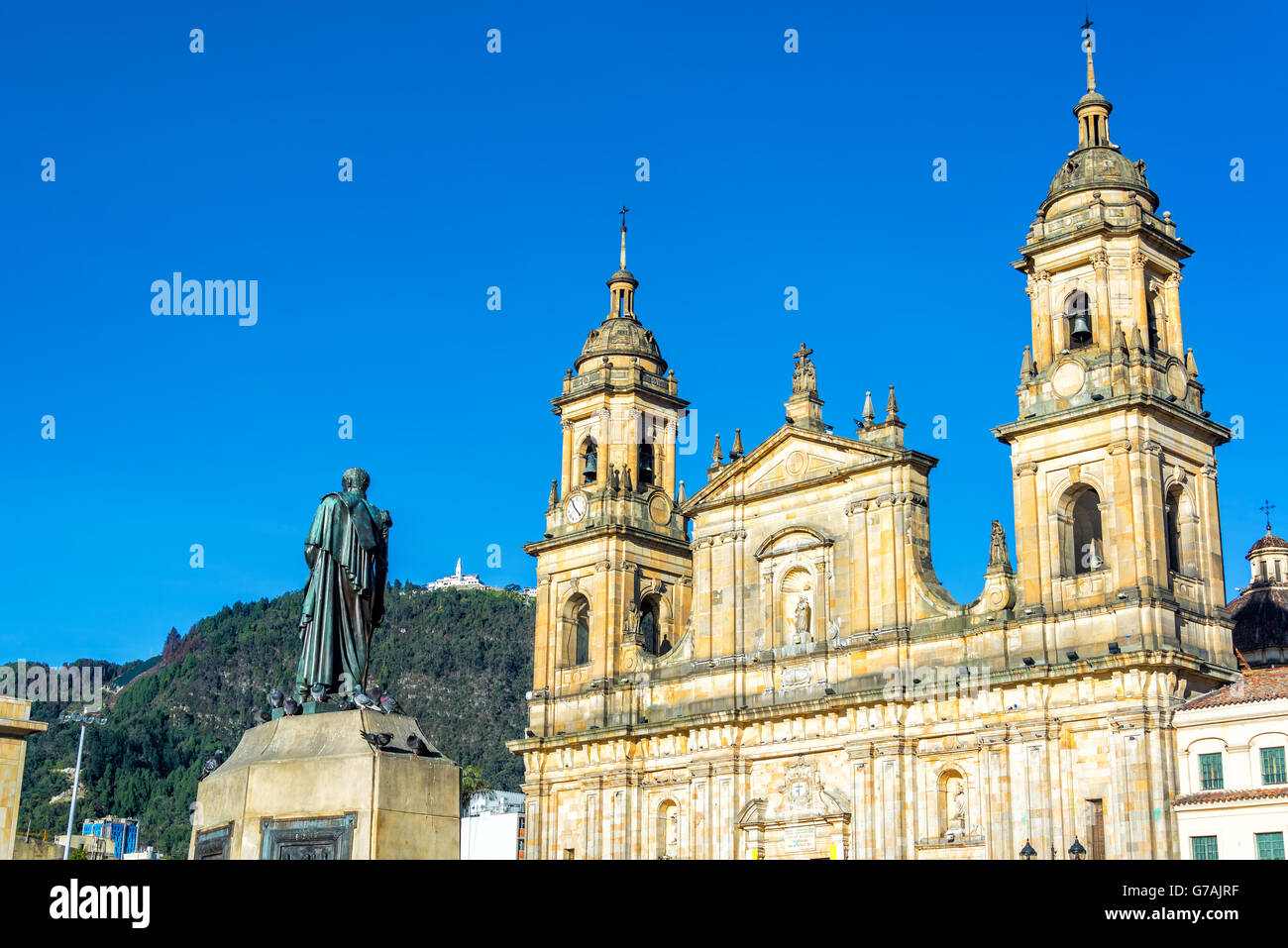 View of the cathedral in the Plaza de Bolivar in the center of Bogota, Colombia with Monserrate visible on the hill Stock Photo