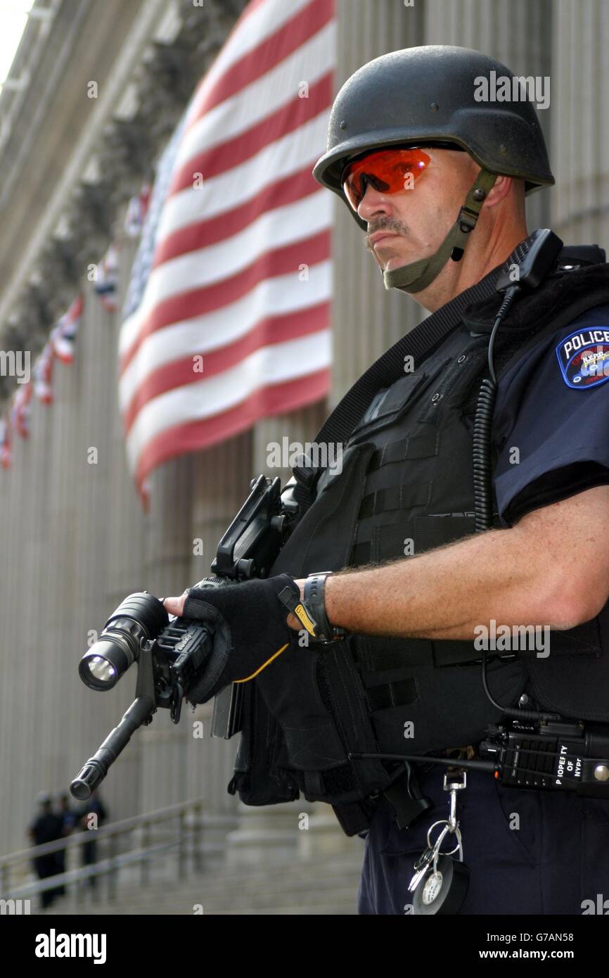 A police officer outside the New York Post Office, directly opposite from Madison Square Garden, New York City, where the Republican National Convention opens on Monday. Stock Photo