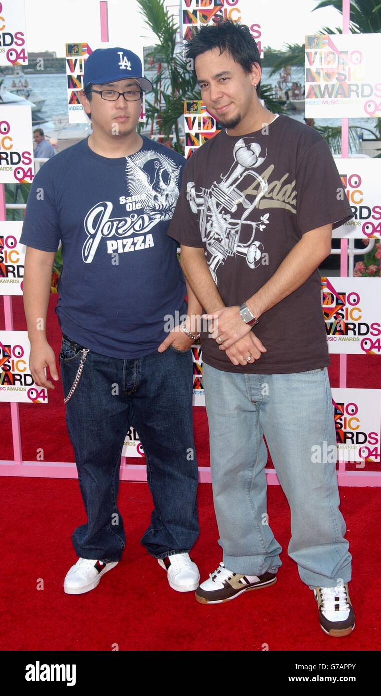 DJ Hamil (left) and Mike Shinoda arrive for the MTV Video Music Awards at the American Airlines Arena in Miami, Florida. Stock Photo
