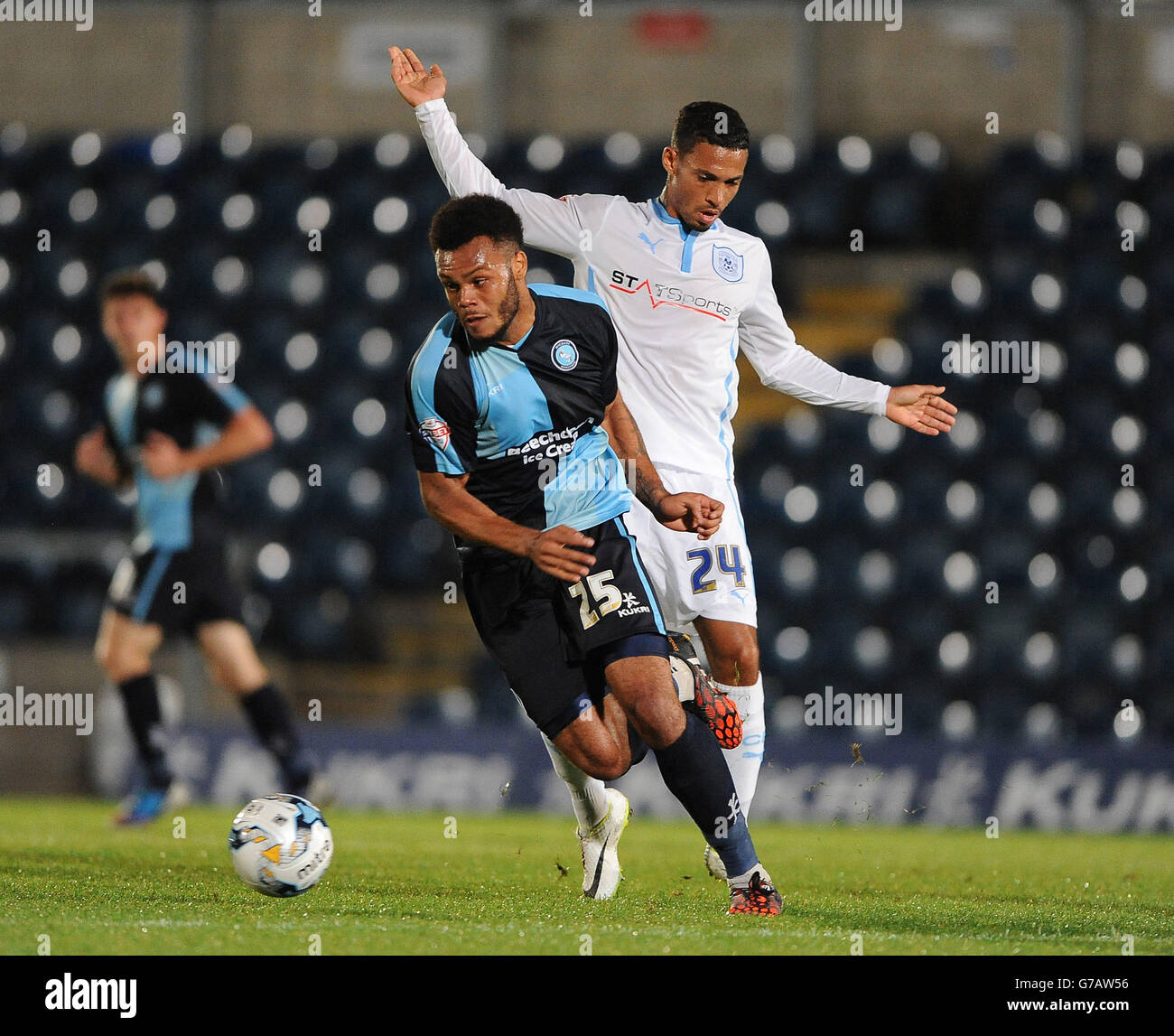 Wanderers Aaron Holloway (front) and Coventry City's Jordan