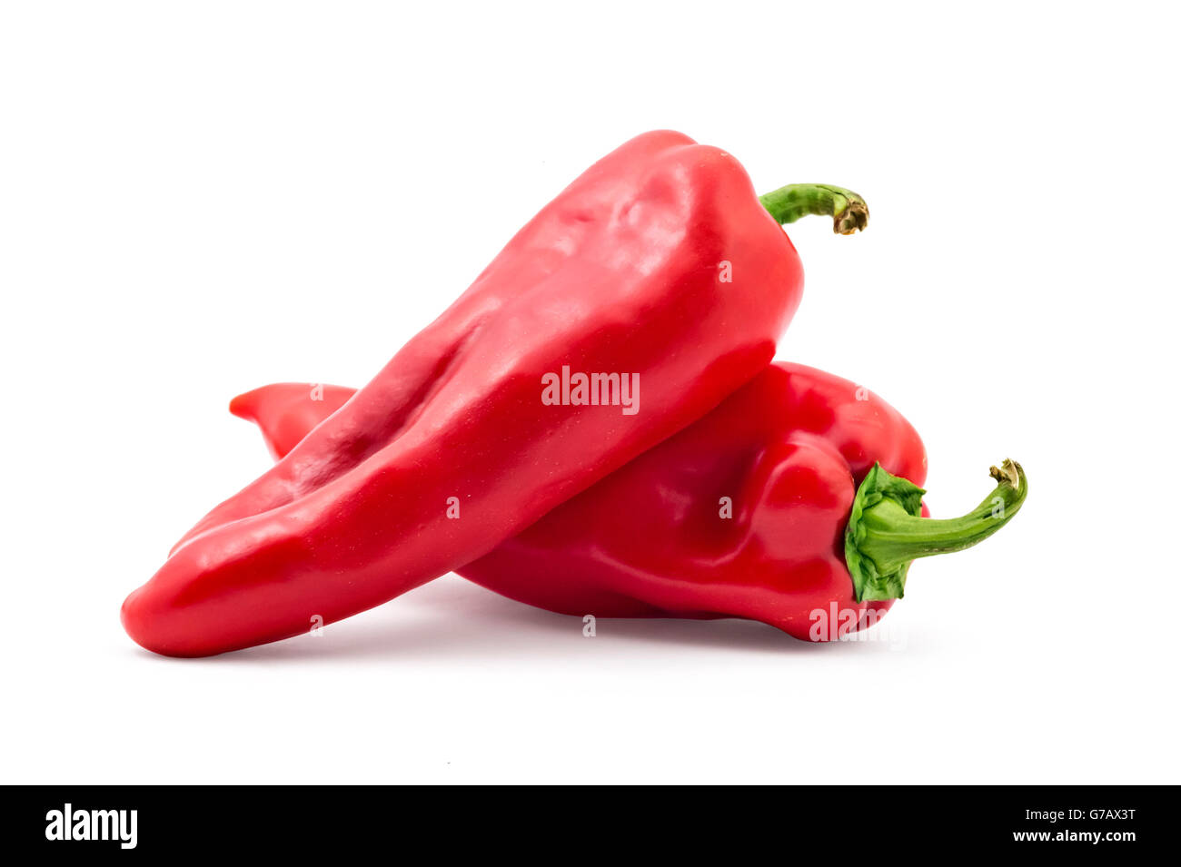 Two fresh sweet red peppers isolated on white background Stock Photo ...