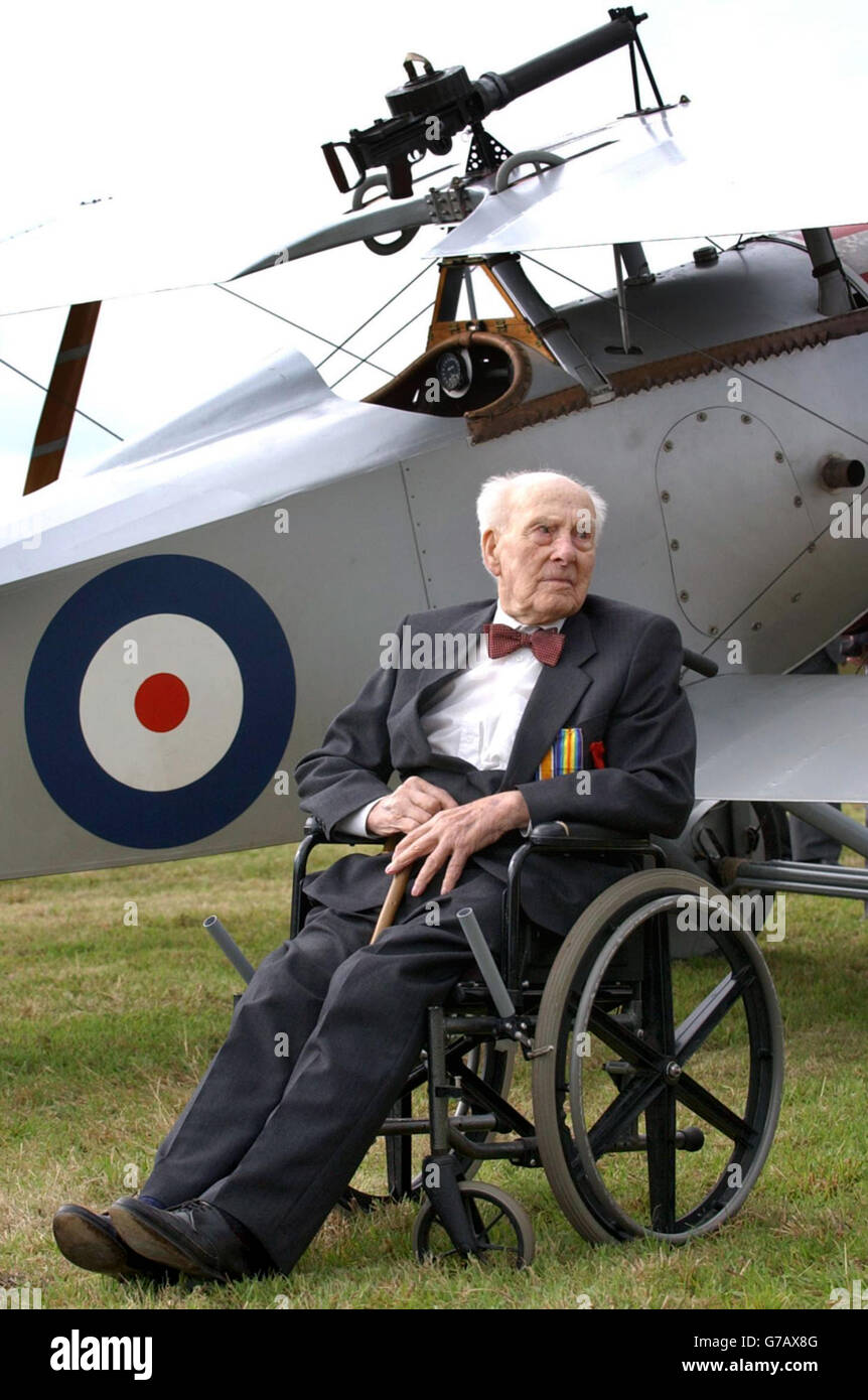 First World War veteran, Henry Allingham,108, stands by a Nieuport bi-plane at the British Air Services Memorial which was unveiled, at St Omer Airfield in France. Stock Photo
